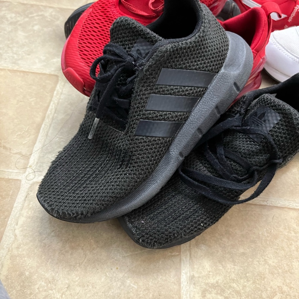 Adidas all black mesh can be considered for athletic or casual